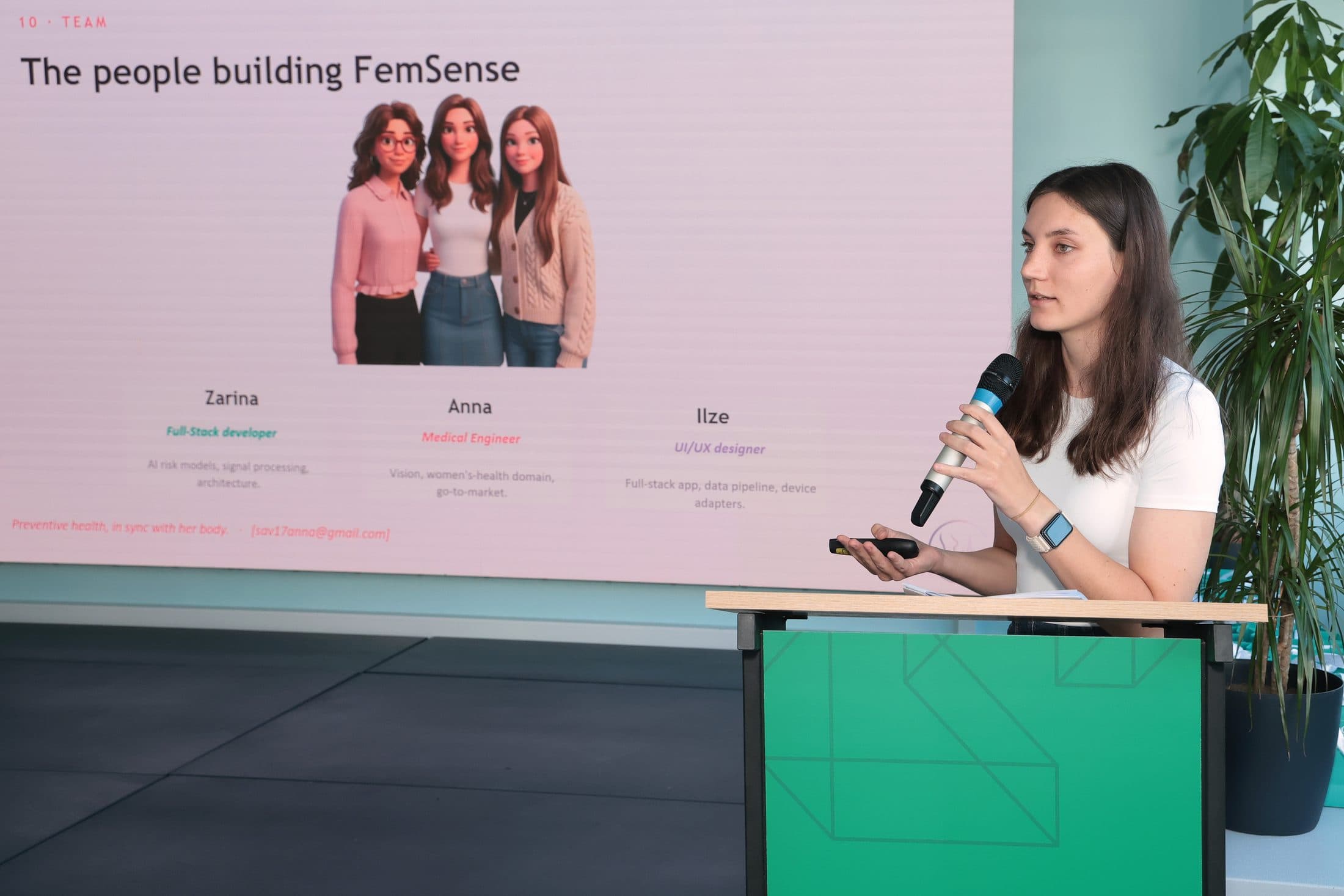 A founder pitching her team and product at the Women's Health & Well-being Hackathon