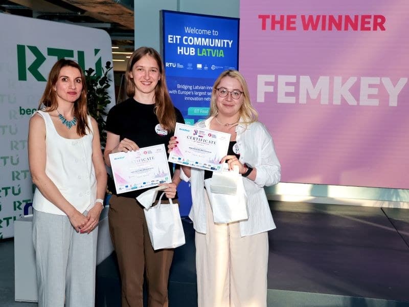 Team FemKey celebrating first place with their certificates